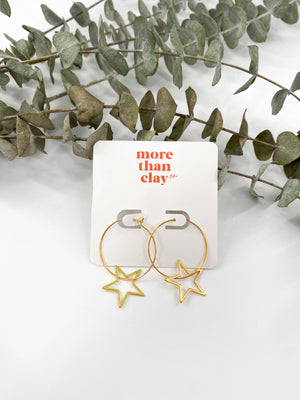 the gold star earrings